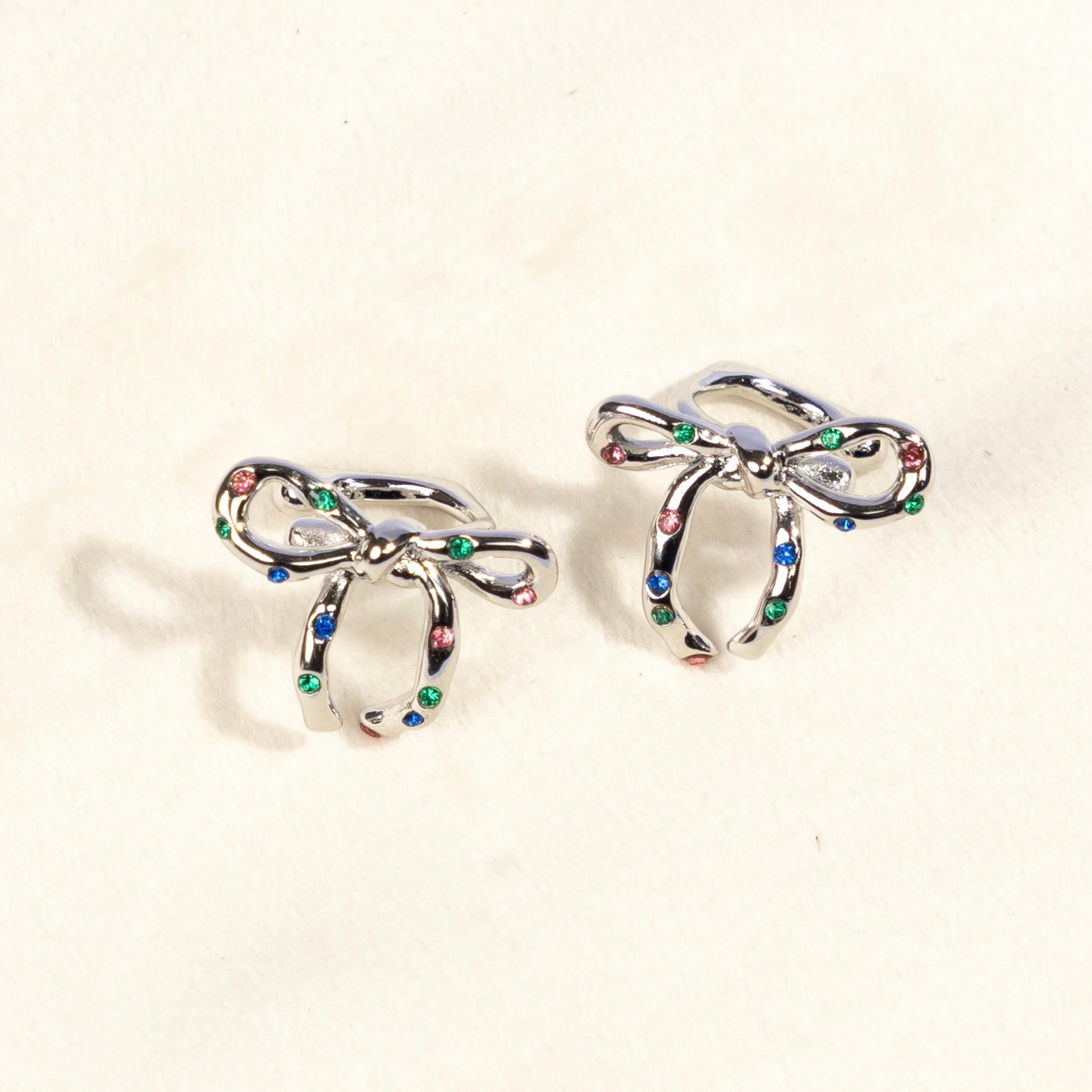 Confetti Silver Bow Ear Cuffs