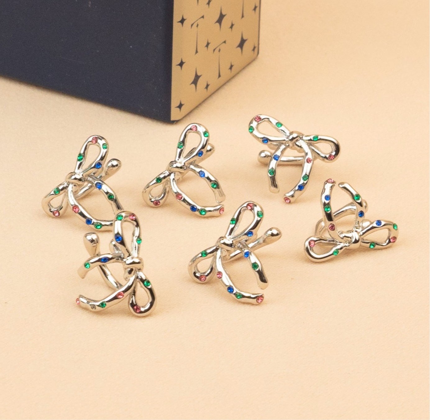 Confetti Silver Bow Ear Cuffs