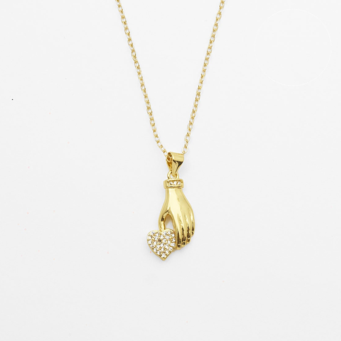 The Heart In Hand Necklace