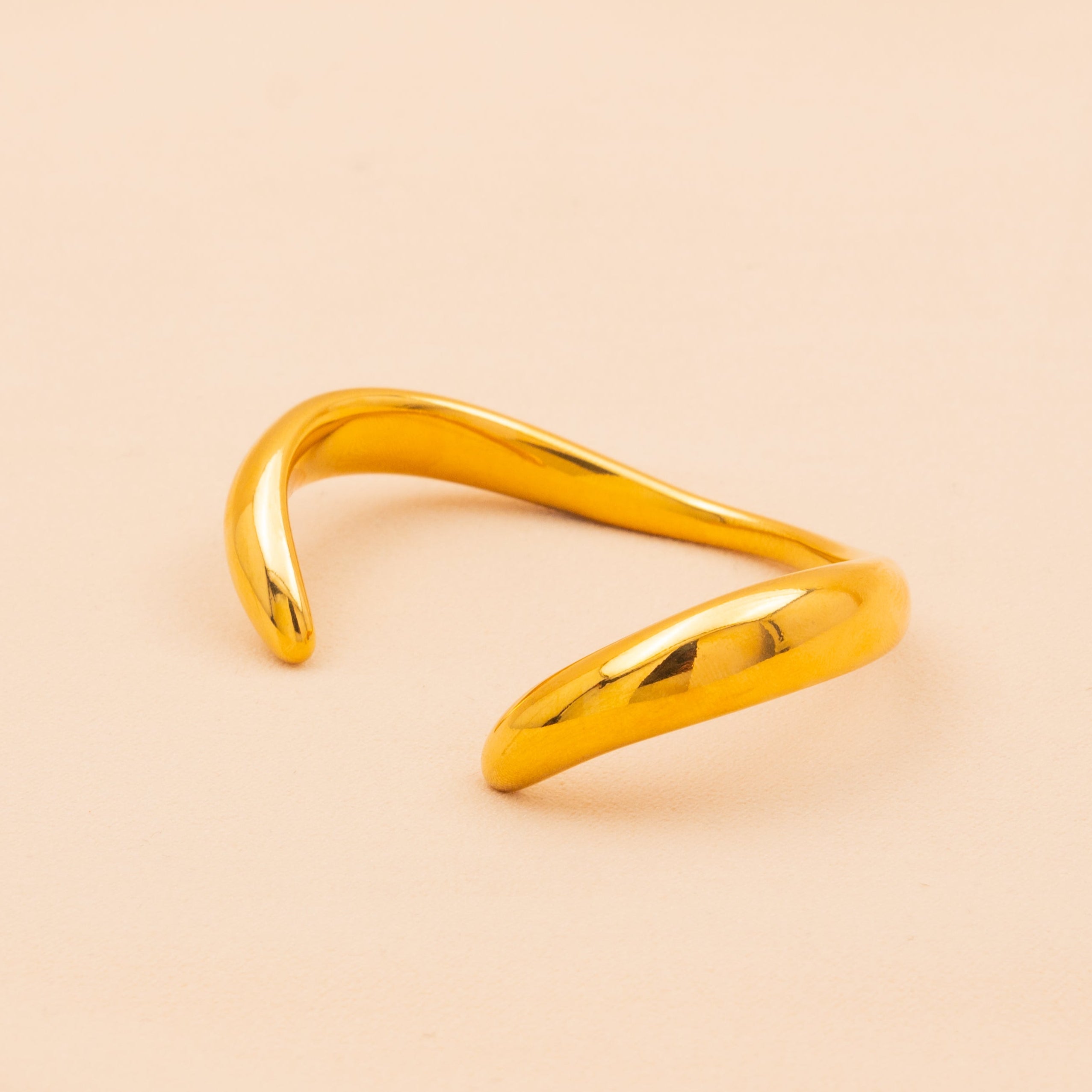 Fluid Curve Golden Bangle