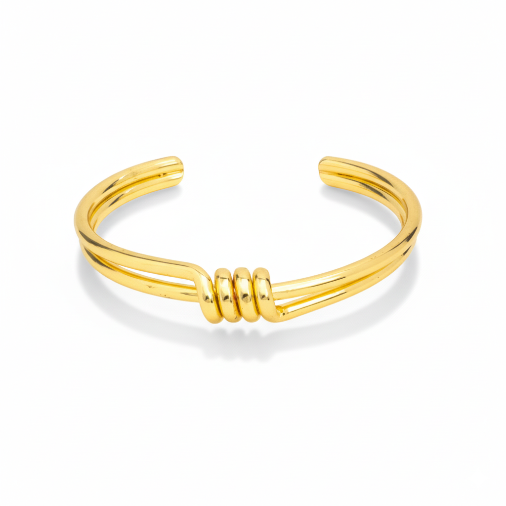 Gold bracelet on a white background
