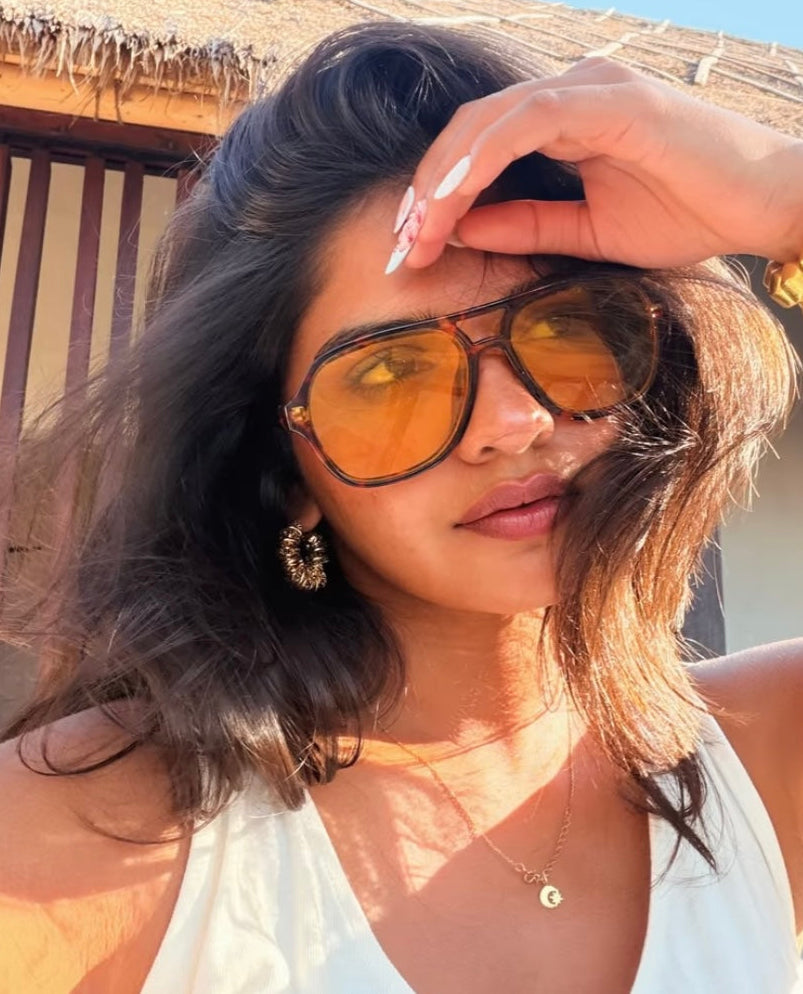 The Raya Twist Hoop Earrings